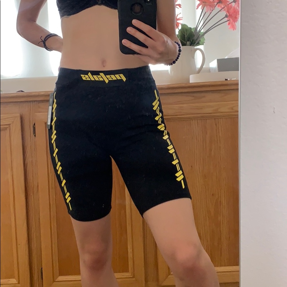 Super cute biker shorts size s “petals” logo